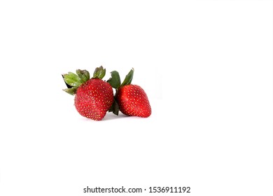 Bad starwberries isolated on white background