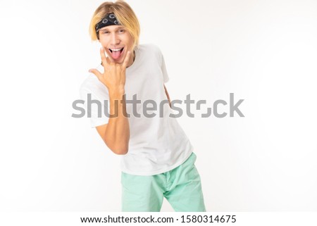 Bad stylish caucasian blonde man isolated on white background