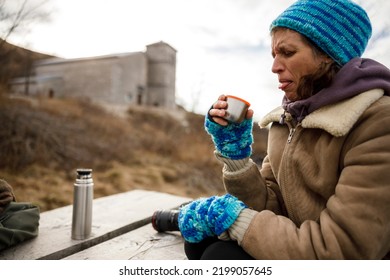 Bad Taste Of Hot Drink From A Thermos For A Female Hiker Outdoors