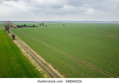Bad weather over the fresh green field in spring season - Shutterstock ID 348060326
