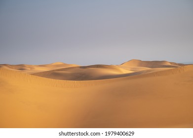 The Badain Jaran Desert is a desert in China which spans the provinces of Gansu, Ningxia and Inner Mongolia. By size it is the third largest desert in China. - Shutterstock ID 1979400629