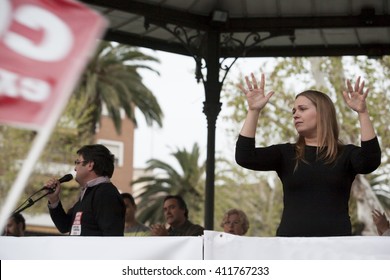 Badajoz, Spain - March 29, 2012: Sign Language Woman Interpreter Gestures During A Meeting That Protests Against Austerity Cuts