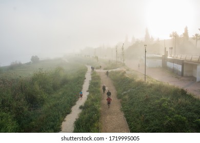 Badajoz, Spain May 2, 2020. People over 14 years old walking and doing physical activity. Coronavirus de-escalation - Shutterstock ID 1719995005