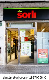 Badalona, Barcelona, Spain - February 26, 2021. Sign and door of Supermercado SORLI, supermarket chain, started in 1970 by Jordi Sorli Arall, throughout Catalonia.