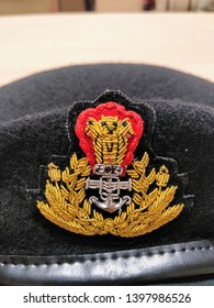 Badge Stitched On A Beret Cap Of An Indian Coast Guard Officer