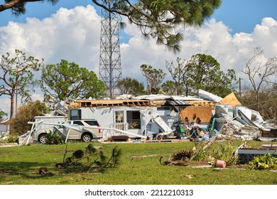 Badly Damaged Mobile Homes After Hurricane Ian In Florida Residential Area. Consequences Of Natural Disaster