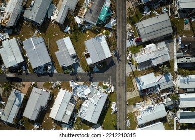 Badly Damaged Mobile Homes After Hurricane Ian In Florida Residential Area. Consequences Of Natural Disaster