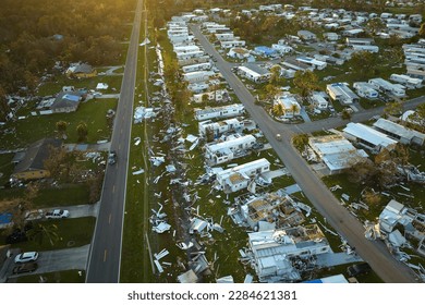 Badly damaged mobile homes after hurricane Ian in Florida residential area. Consequences of natural disaster - Shutterstock ID 2284621381