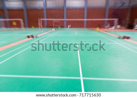badminton court with blurred background woman playing badminton