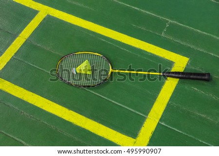 Badminton racket and shuttlecock - sport background