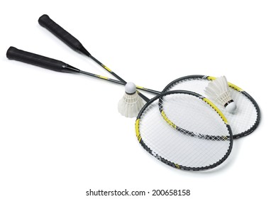 Badminton rackets and shuttlecocks isolated on white
