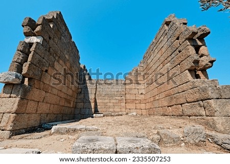 Bafa, Turkey - July 15, 2023: The ruins of ancient city of Herakleia and Latmos Athena temple located on the shore of Lake Bafa