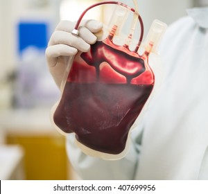 Bag Of Blood In Hand Asian Doctor