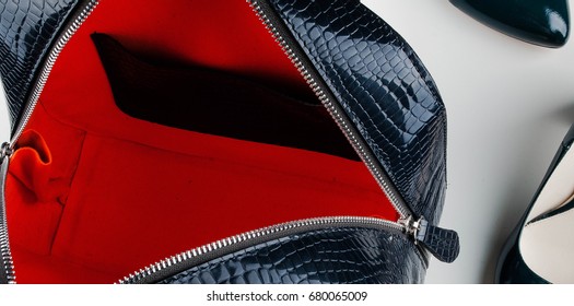 Bag With Buckled Pocket. A Foldable Woman's Bag On A White Background From Above.