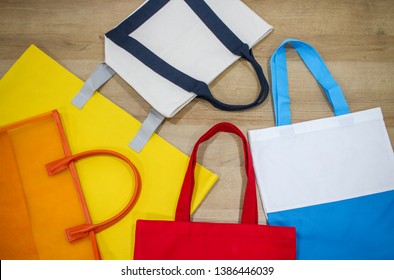 Bag And Canvas Tote Bags On Table Top.