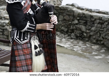 Bag pipe and scottish kilt