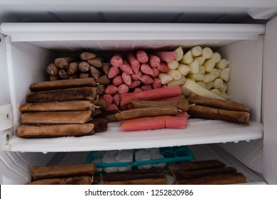 Bag popsicle in the freezer. Flavors: strawberry, chocolate and coconut.