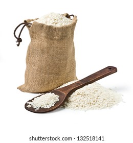 Bag Of Rice And A Wooden Spoon On A White Background. Keeping Paths