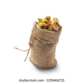 Bag With Tasty Pistachio Nuts On White Background