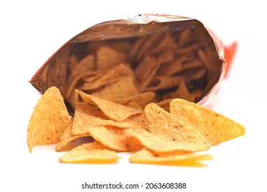 A Bag Of Tortilla Chips Isolated On White Background.
Corn Chips Waiting For Cheese