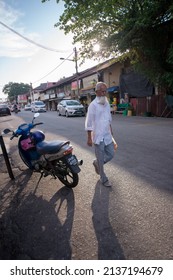 Bagan, Penang, Malaysia - Circa Jun 2017: A Man Walk At The Old Street At Butterworth Town.