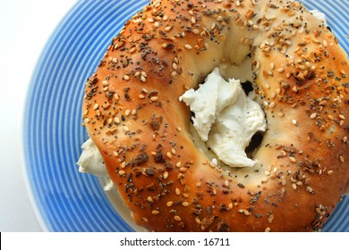 Bagel With Cream Cheese On Plate