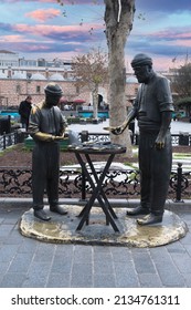 Bagel peddler selling statue. Eminonu one of the most interesting place to visit. 28 December-2021 Eminonu, istanbul Turkey.  