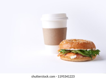 bagel with salmon and coffee to go isolated on white background - Powered by Shutterstock