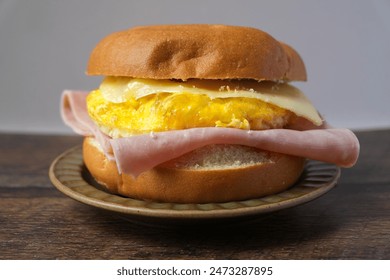 bagel sandwich with ham and egg - Powered by Shutterstock