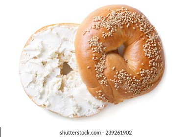 Bagel With Sesame And Cream Cheese Isolated On White Background. Top View 