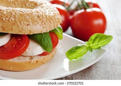 bagel with tomato mozzarella