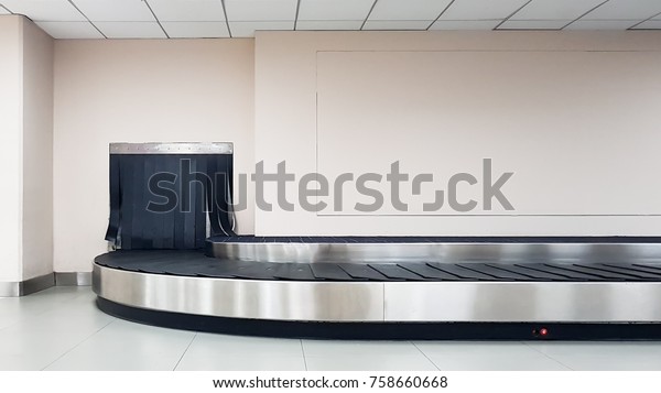 Baggage conveyor belt at the\
airport