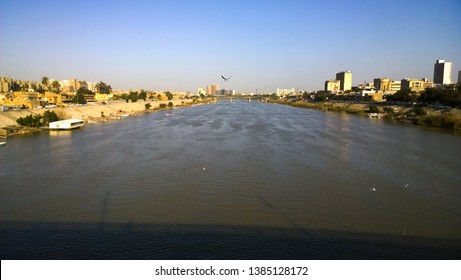 Baghdad, Iraq – April 11, 2019: Photo For The City Of Baghdad ,And Shows Where Residential Complexes And The Tigris River And Bridges At Night. 