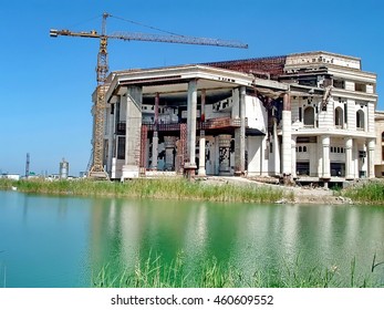 BAGHDAD, IRAQ - CIRCA 2005: Palace Under Construction During The US Invasion Of Iraq, Abandoned With Tower Cranes Around It