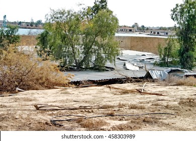 BAGHDAD, IRAQ - CIRCA 2005: Sheet Metal Covering An Underground Bunker On A Former Baath Party Compound