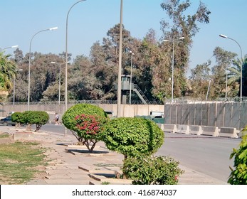 BAGHDAD, IRAQ - CIRCA 2007: Road And Blast Barriers With Towers At The Front Of The Old US Embassy Compound 