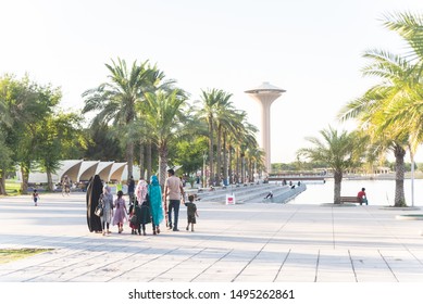 Baghdad, Iraq – July  04, 2019: Family Holiday Vacation Amusement Park Togetherness.Sunny Day For Spending Time With Family.