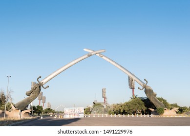 Baghdad, Iraq – July 15, 2019: Hands Of Victory Or The Crossed Swords.Monument To Fallen Soldiers In Iraq. Space For Text.