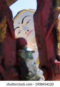 Bago, Myanmar-December 12, 2014-Shwethalyaung Buddha Pagoda. Selective focus close-up face shots, Bago (Pegu)