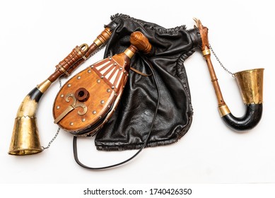 Bagpipes, a traditional musical instrument. Bagpipes are a woodwind musical instrument from the group of reed aerophones (pipe aerophone). Close-up and white background.