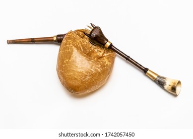 Bagpipes, A Traditional Musical Instrument. Bagpipes Are A Woodwind Musical Instrument From The Group Of Reed Aerophones (pipe Aerophone). Close-up And White Background.