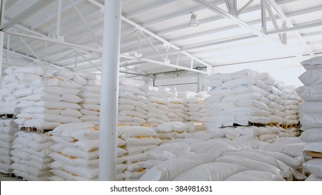 Bags With Flour In Warehouse Of Flour Factory. Flour Stock. Mill Warehouse.