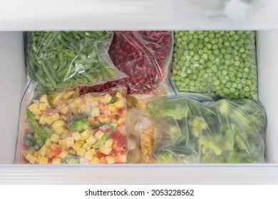 Bags Of Frozen Vegetables In The Freezer Drawer