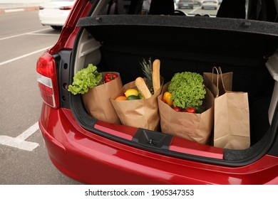 Bags Full Of Groceries In Car Trunk Outdoors