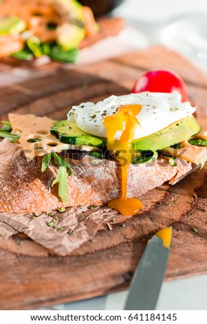 Similar – Image, Stock Photo Baked eggs in baguette bread. Breakfast with eggs and loaf