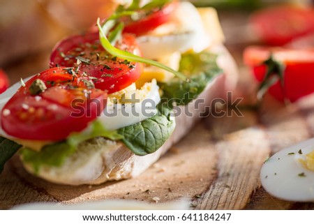 Similar – Image, Stock Photo Baked eggs in baguette bread. Breakfast with eggs and loaf