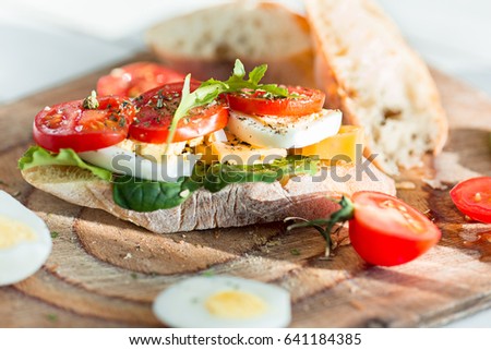 Similar – Image, Stock Photo Baked eggs in baguette bread. Breakfast with eggs and loaf