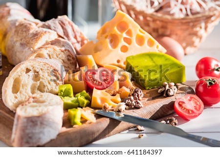 Similar – Image, Stock Photo Baked eggs in baguette bread. Breakfast with eggs and loaf
