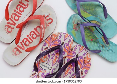 Bahia, Brazil - March 1, 2021: Old And New Brazilian Havaianas Flip Flops Sandals On White Background. Havaianas From Brazil.