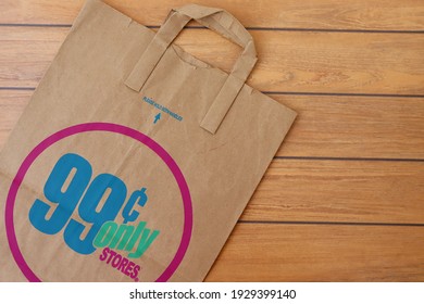 Bahia, Brazil - March 4, 2021. 99 Cents Only Stores Shopping Bag On Wooden Background.